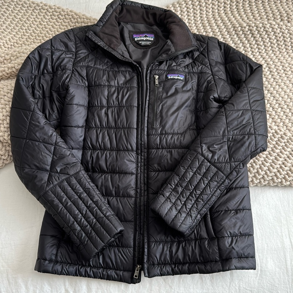 Women’s black Patagonia jacket. Size medium.